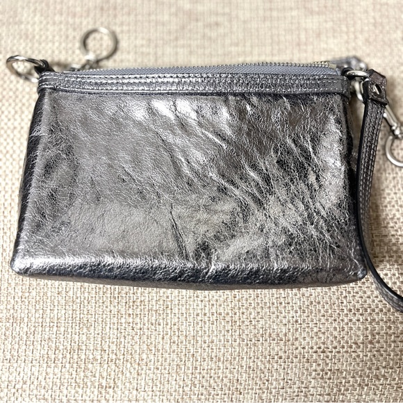 Coach Poppy Gunmetal Wristlet, EUC, clean bright interior, tag inside, 8 x5”